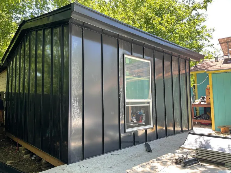 Black standing seam metal wall panels for Roof Inspection in Fultondale