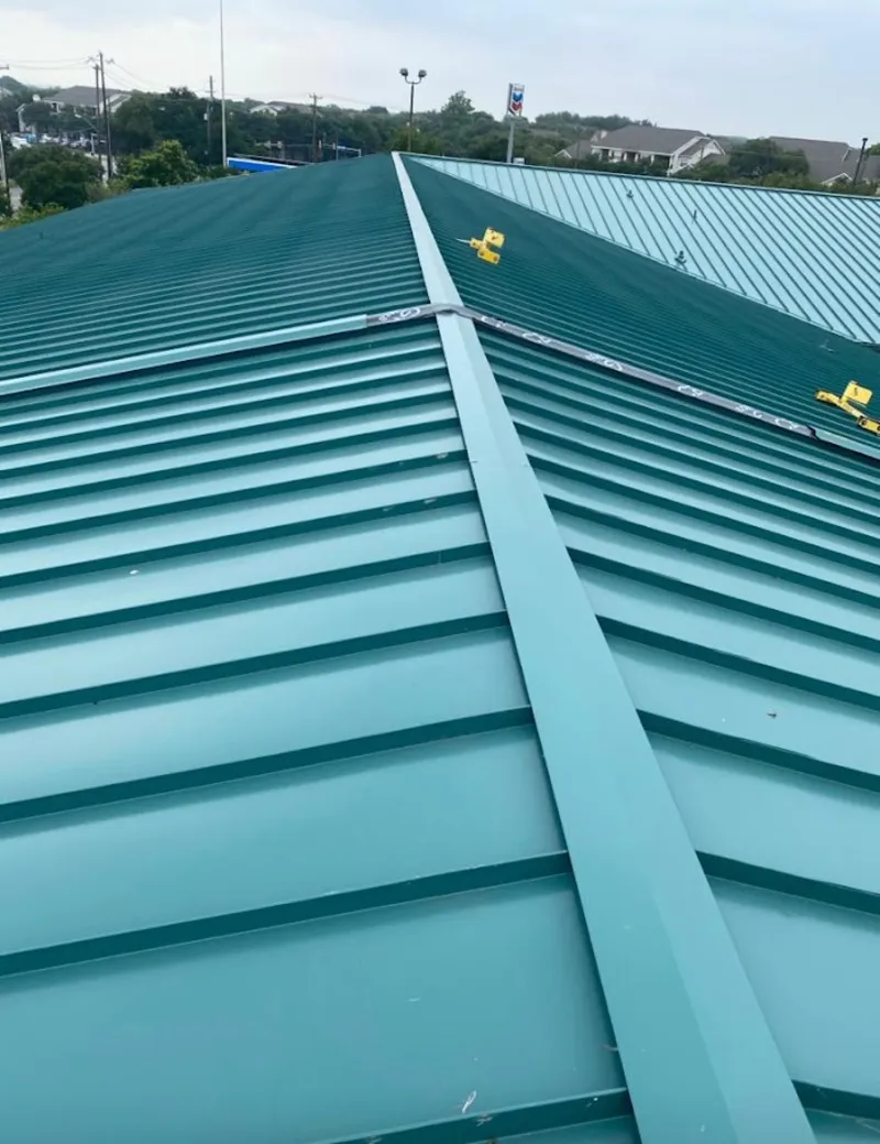 Green commercial metal roof ridge and valley for Metal Roof Repair in Fultondale